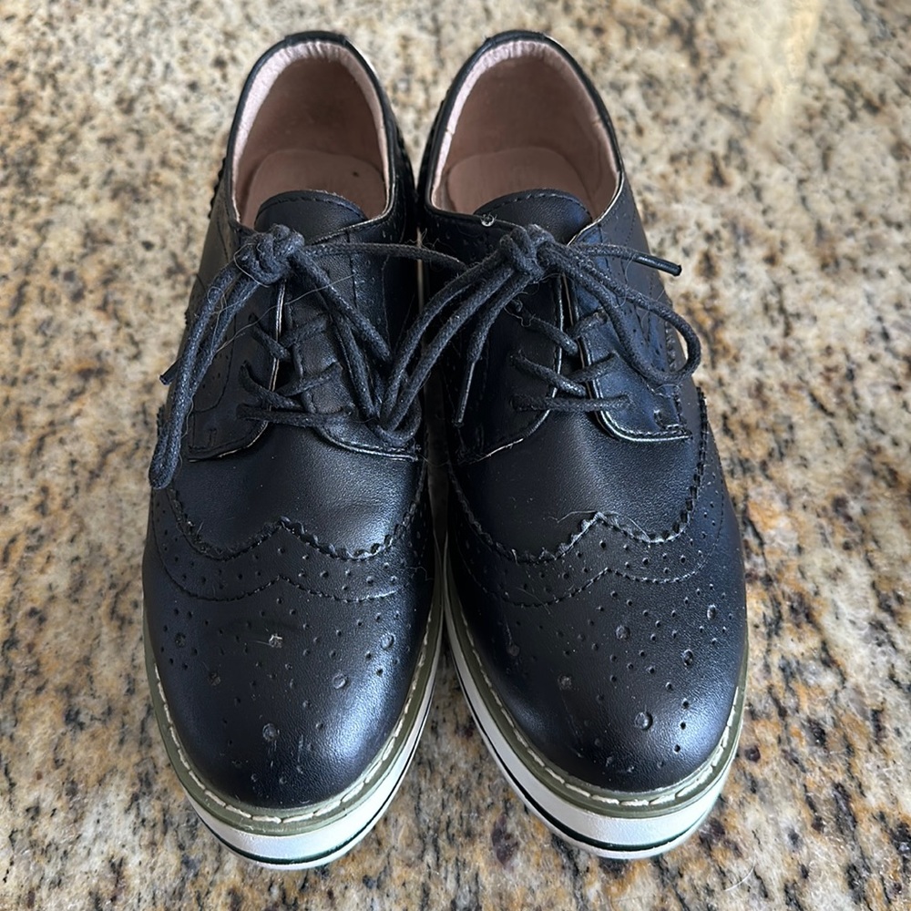 Black Oxford platforms